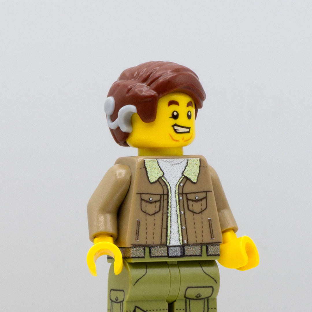 Minifigure wearing a short brown swept LEGO hair with a cochlear implant on the right side.