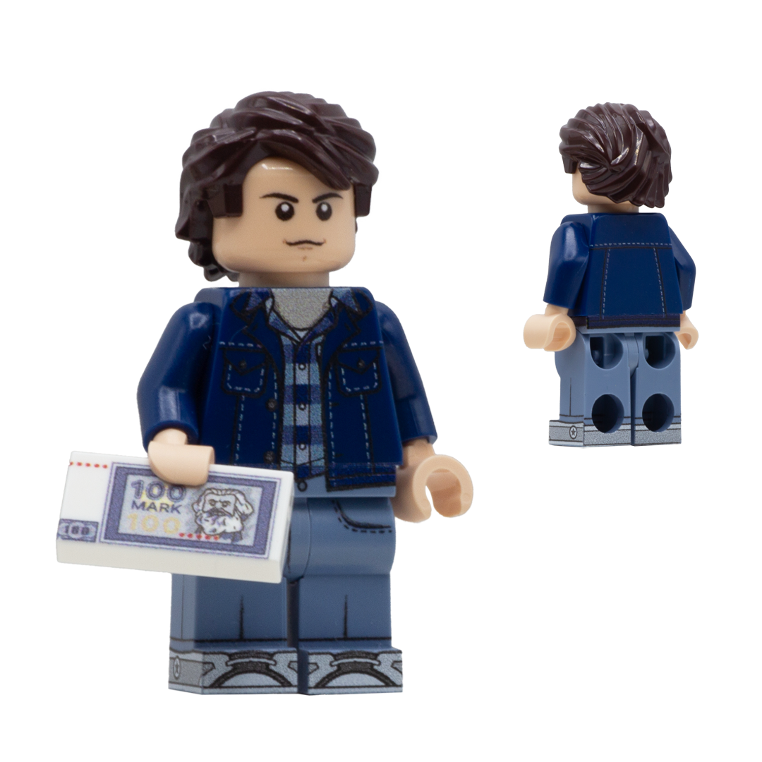 A toy minifigure shown from the front and back on a plain white background. The figure has brown hair, a light flesh face, a blue jacket over a gray shirt, blue pants, and is holding a white 100-mark banknote.
