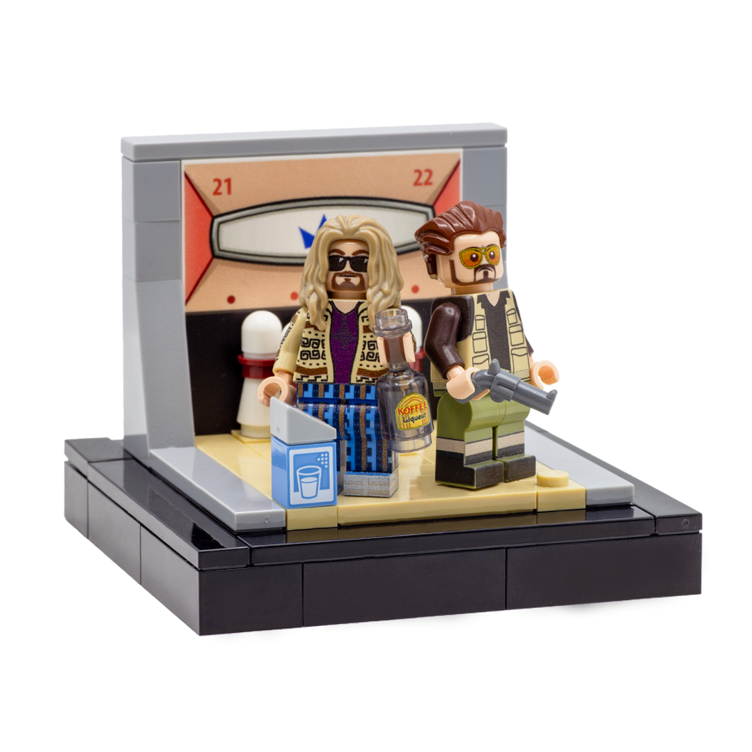 Two minifigure inspired by the main characters from The Big Lebowski movie - The Dude and Walter, standing on the custom LEGO minibuild of a bowling alley.