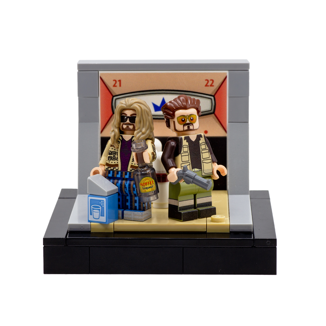 Two minifigure inspired by the main characters from The Big Lebowski movie - The Dude and Walter, standing on the custom LEGO minibuild of a bowling alley.