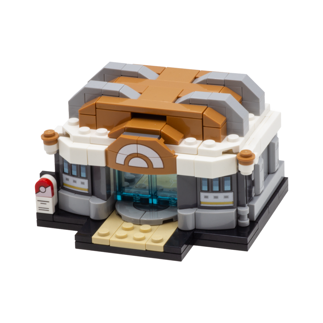 A custom LEGO minibuild depicting a Pokemon Training Gym, featuring brown, white, gray, black, and beige bricks and transparent blue doors which can open and shut. 