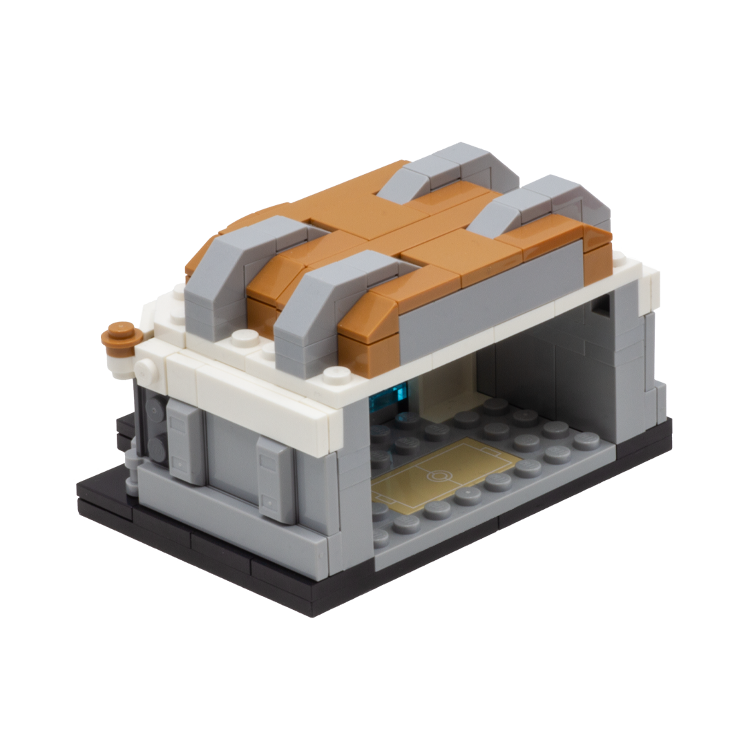 The back of a custom LEGO build of a Pokemon Training Gym. It features white, grey and beige bricks.