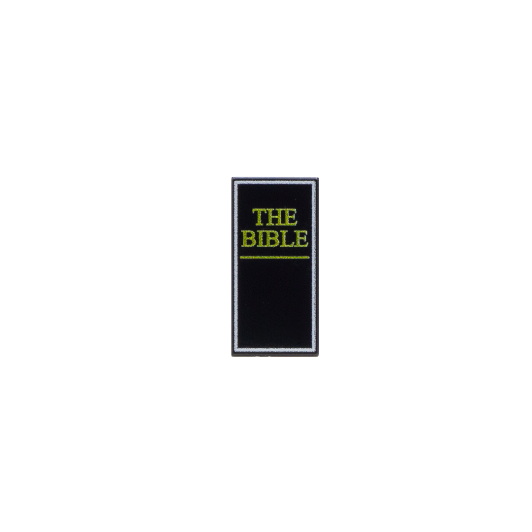 Custom black LEGO tile with The Bible title printed on it.