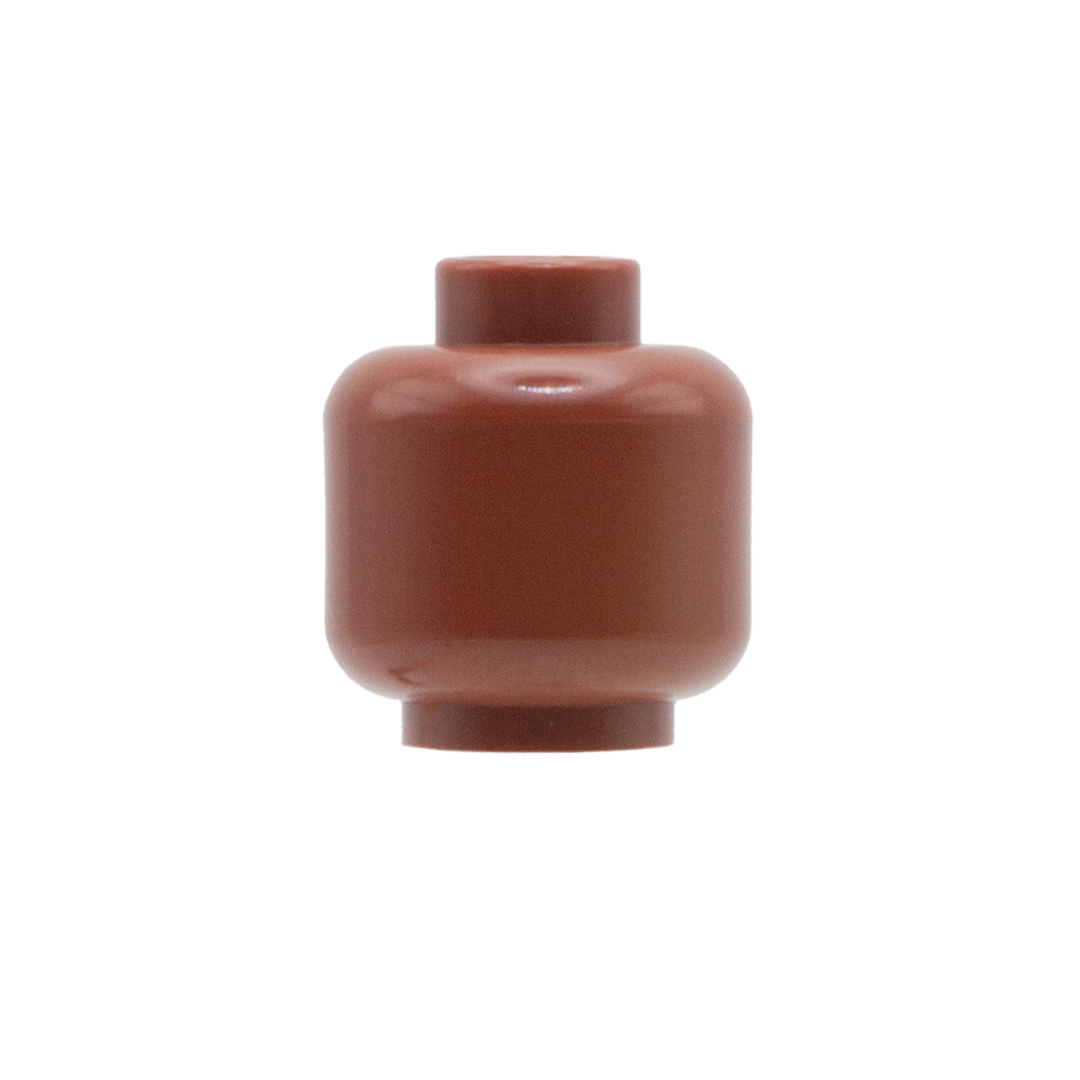 A blank dark flesh Lego minifigure head