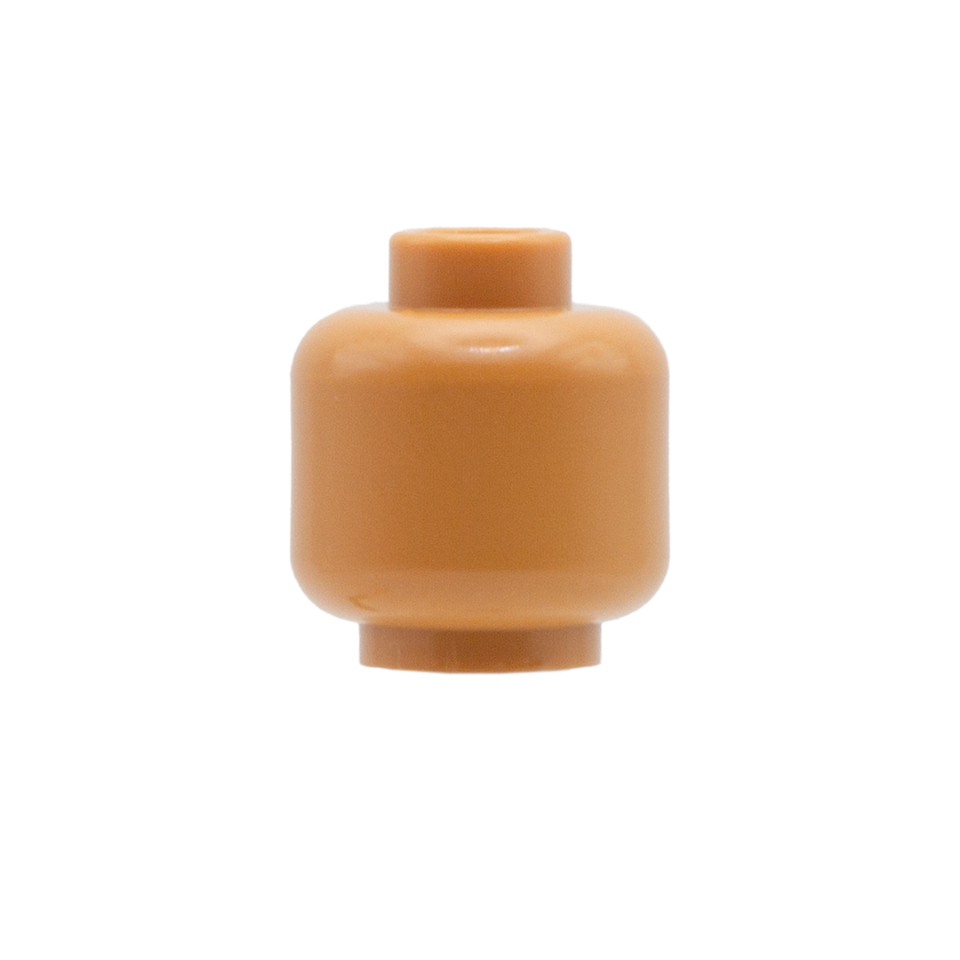 A blank medium flesh Lego minifigure head