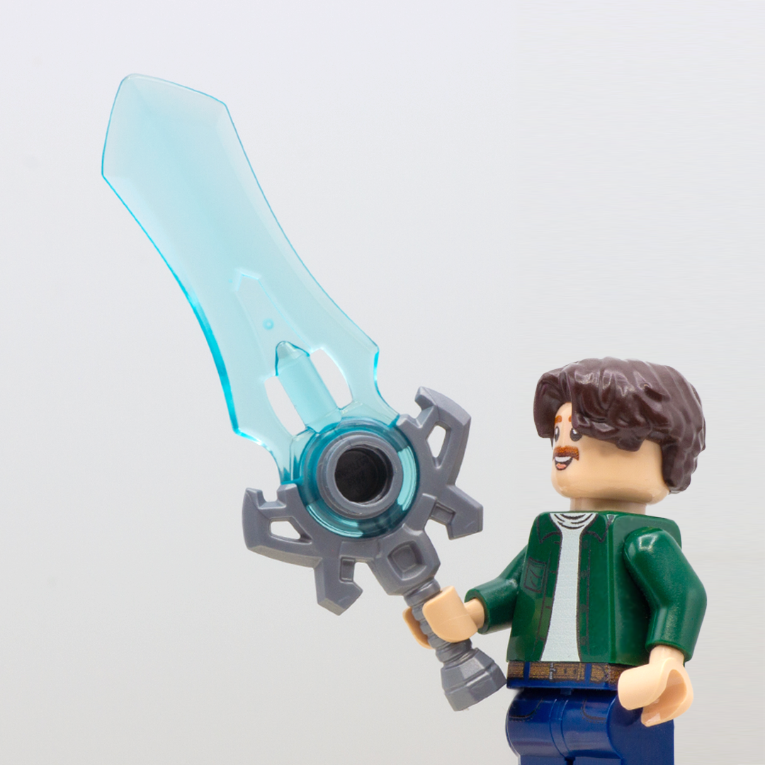 LEGO minifigure holding large blue-bladed translucent fantasy sword with silver handle