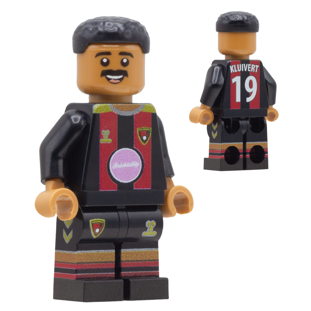 A LEGO minifigure of AFC Bournemouth footballer Justin Kluivert. The figure is wearing a black soccer jersey with red, gold accents and the name 'KLUIVERT' and number '19' are printed on the back.