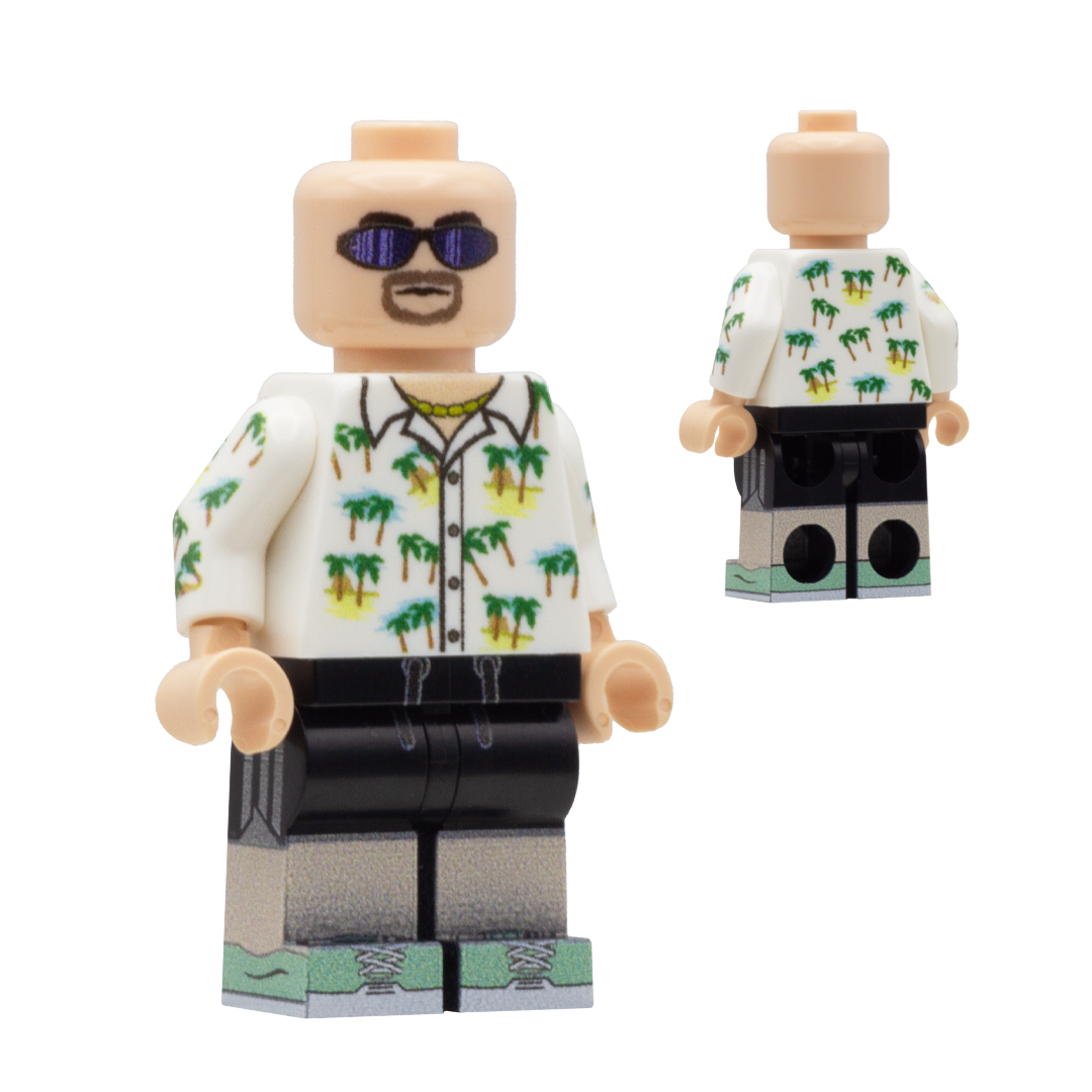 Custom Design LEGO Minifigure of Jason Duval from GTA 6  - The figure is a Caucasian male wearing a white shirt with palm trees on it and a gold chain. He is bald, with a goatee and sunglasses. He is wearing black sports shorts.