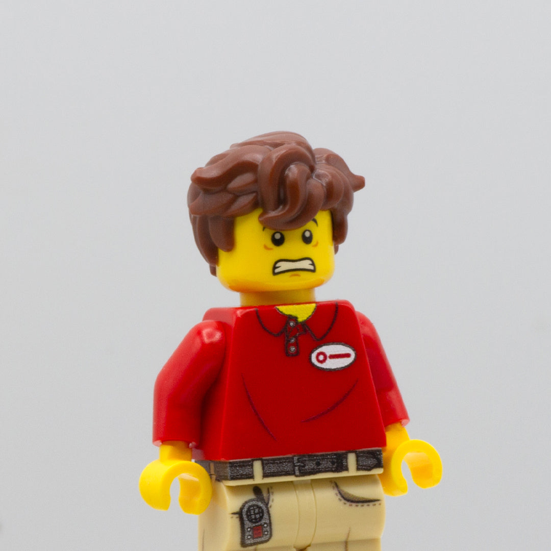 A custom LEGO minifigure wearing a brown LEGO minifigure hair accessory - messy and tousled. 