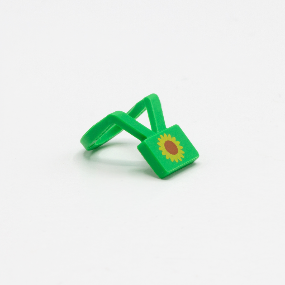 Custom green LEGO lanyard with sunflower printed on it.