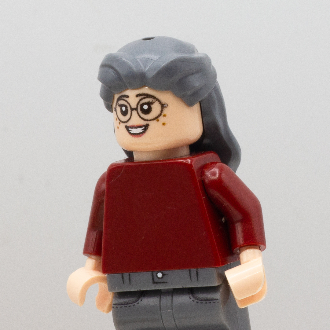 Minifigure with Dark Grey LEGO hair with pinned back curls