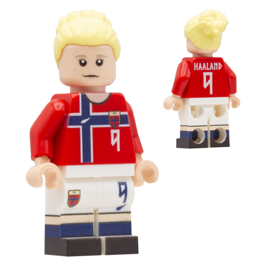 A LEGO minifigure depiciting Erling Haaland with blond hair, a light complexion face; wears a red and white Norway football kit with the text '9' on the front and 'HARLAND 9' on the back, along with white shorts and blue socks.