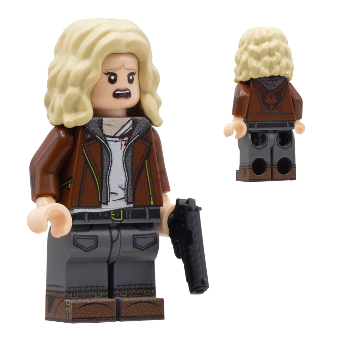 Custom LEGO Minifigure inspired by Grace from Resident Evil 9 game, with blonde hair, wearing a brown leather jacket and holding a 3D-rinted minifigure gun.