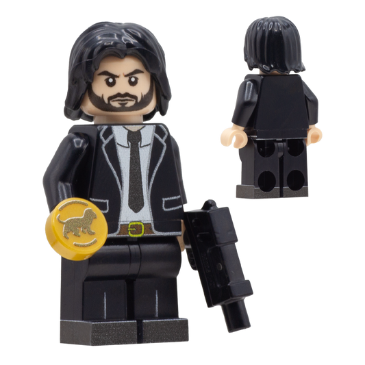 A black minifigure with long dark hair, a beard, and a black suit, shown from the front and back on a plain white background. The front figure holds a gold coin with a lion emblem and a black gun. John Wick Custom LEGO Minifigure.