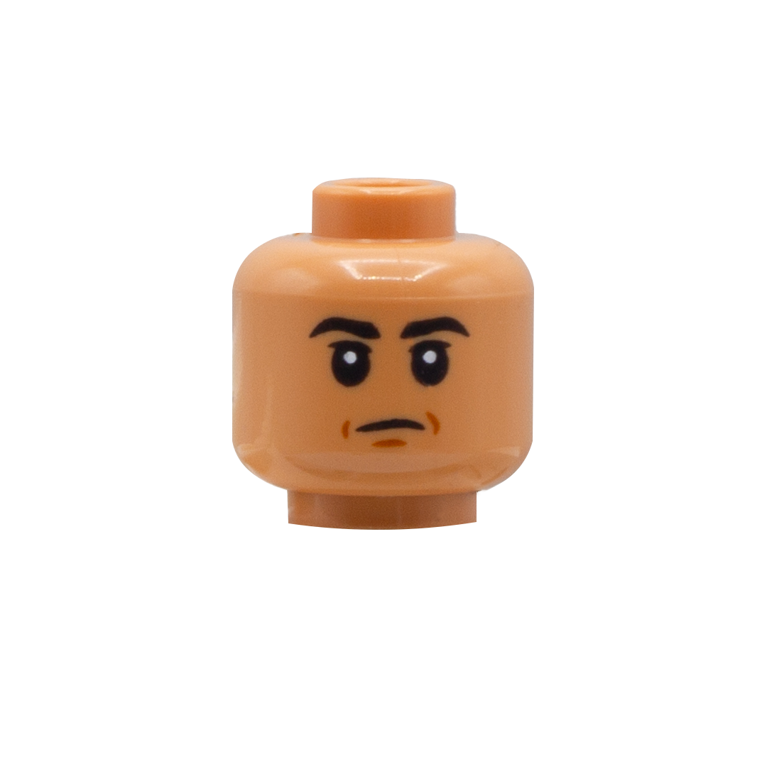 LEGO minifigure head in Nougat Flesh skin tone with big eyes, thick black eyebrows and an unhappy face.