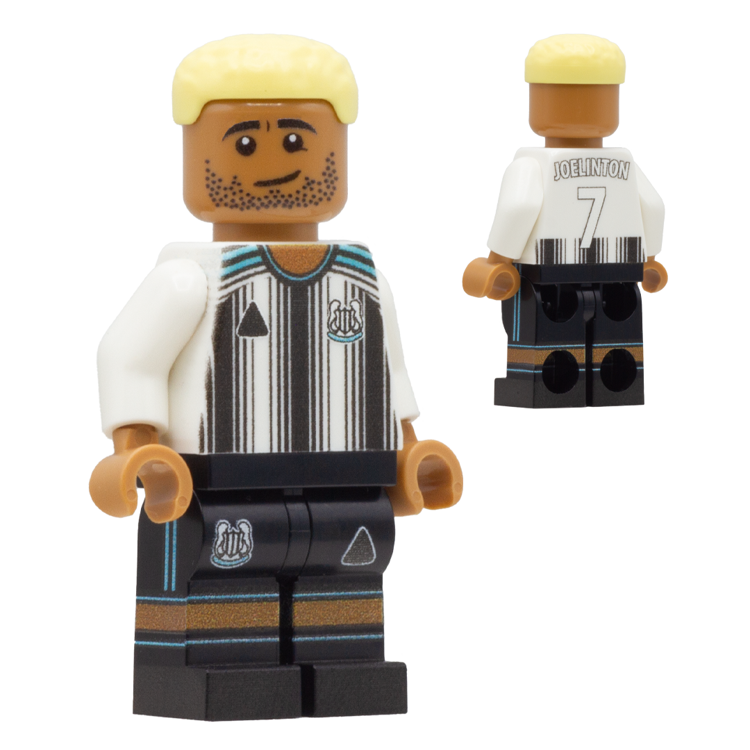 A LEGO-style soccer minifigure of Newcastle United footballer Joelinton. The figure has a tan skin tone, blond hair, and a striped white and black jersey with a club crest, plus black shorts with blue accents.