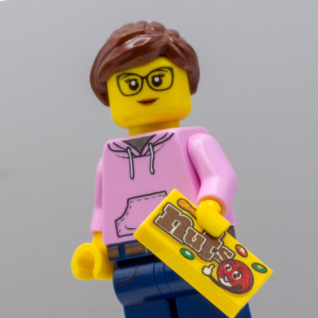 Custom LEGO Minifigure holding Choc Nuts Candy (Minifigure Accessory based on M and Ms)