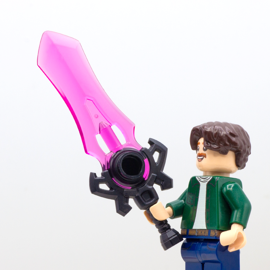 LEGO minifigure holding large pink-bladed translucent fantasy sword with black handle