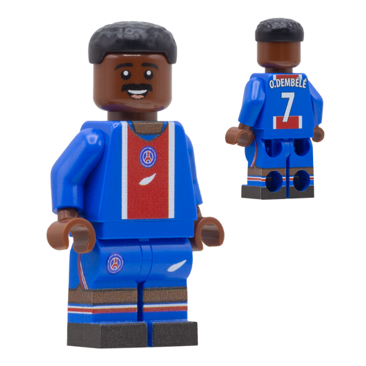 A toy minifigure of PSG footballer, Ousmane Dembele. The figure wears a blue soccer jersey and shorts with a red chest panel, white trim, and a circular crest.