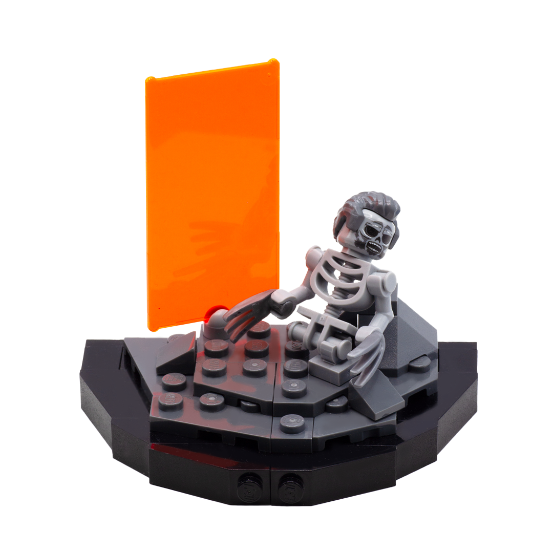 Custom LEGO display based on the scene from Deadpool and Wolverine movie, featuring orange Timedoor and the remains of Wolverine in LEGO form.