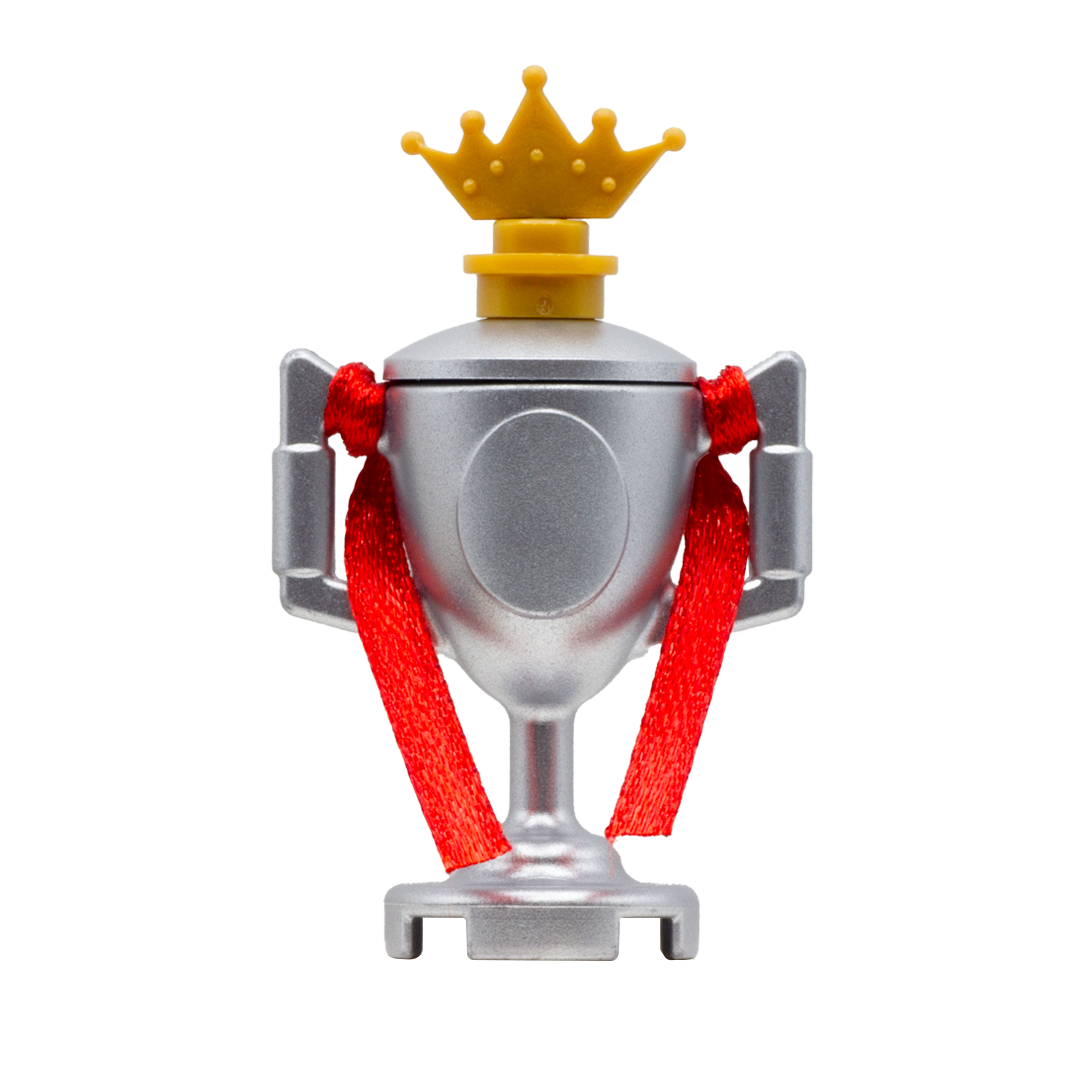 LEGO minifigure silver trophy with red ribbon and a golden crown.