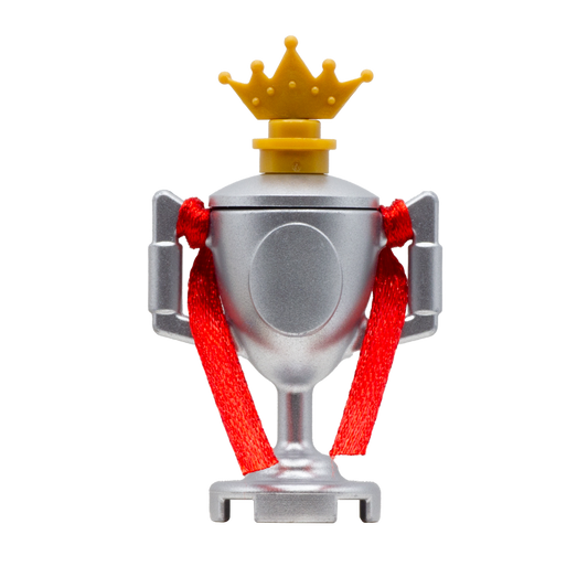 LEGO minifigure silver trophy with red ribbon and a golden crown.