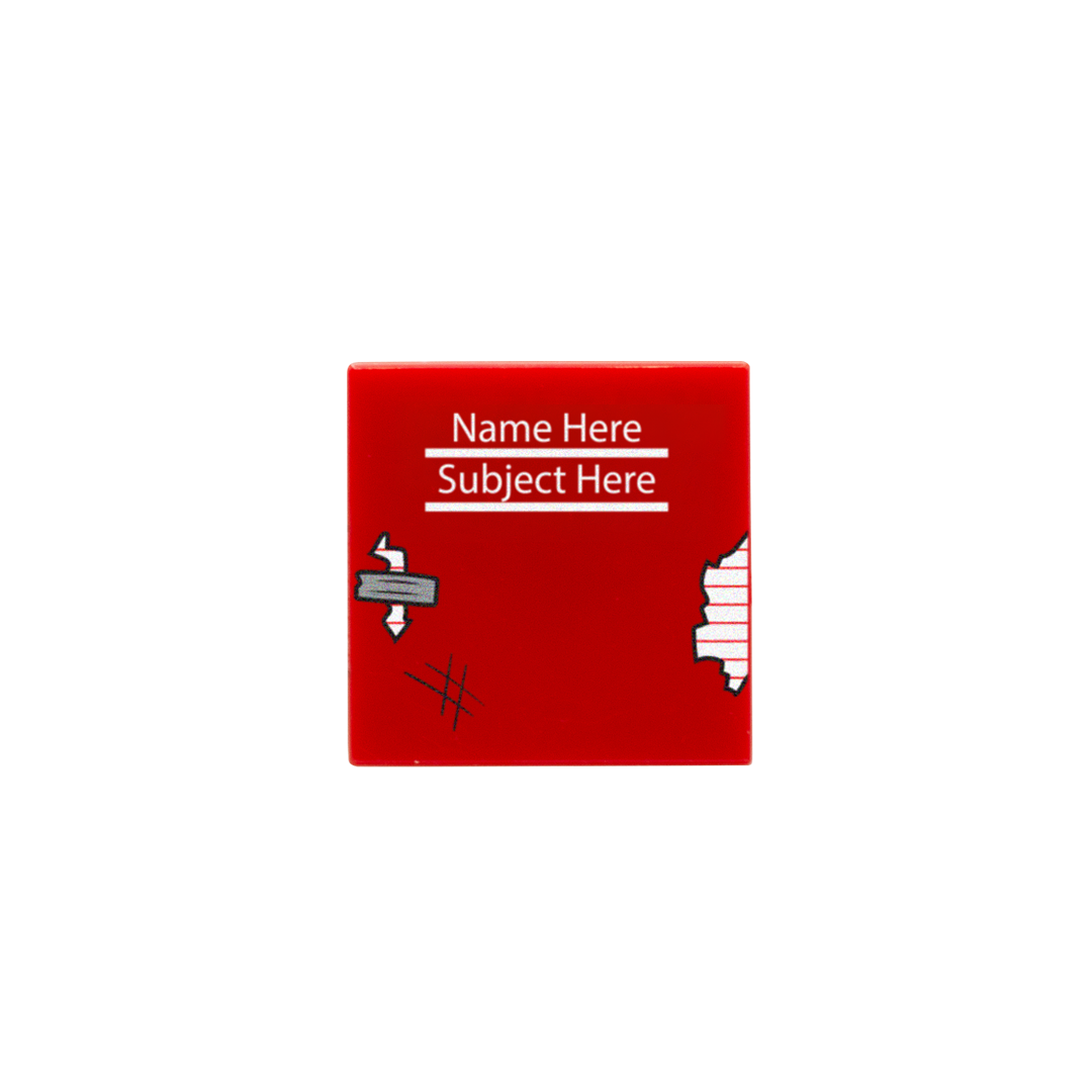 Personalised red custom LEGO tile with a school exercise book design which is scruffy looking (text reads 'Name Here' then 'Subject Here' below)
