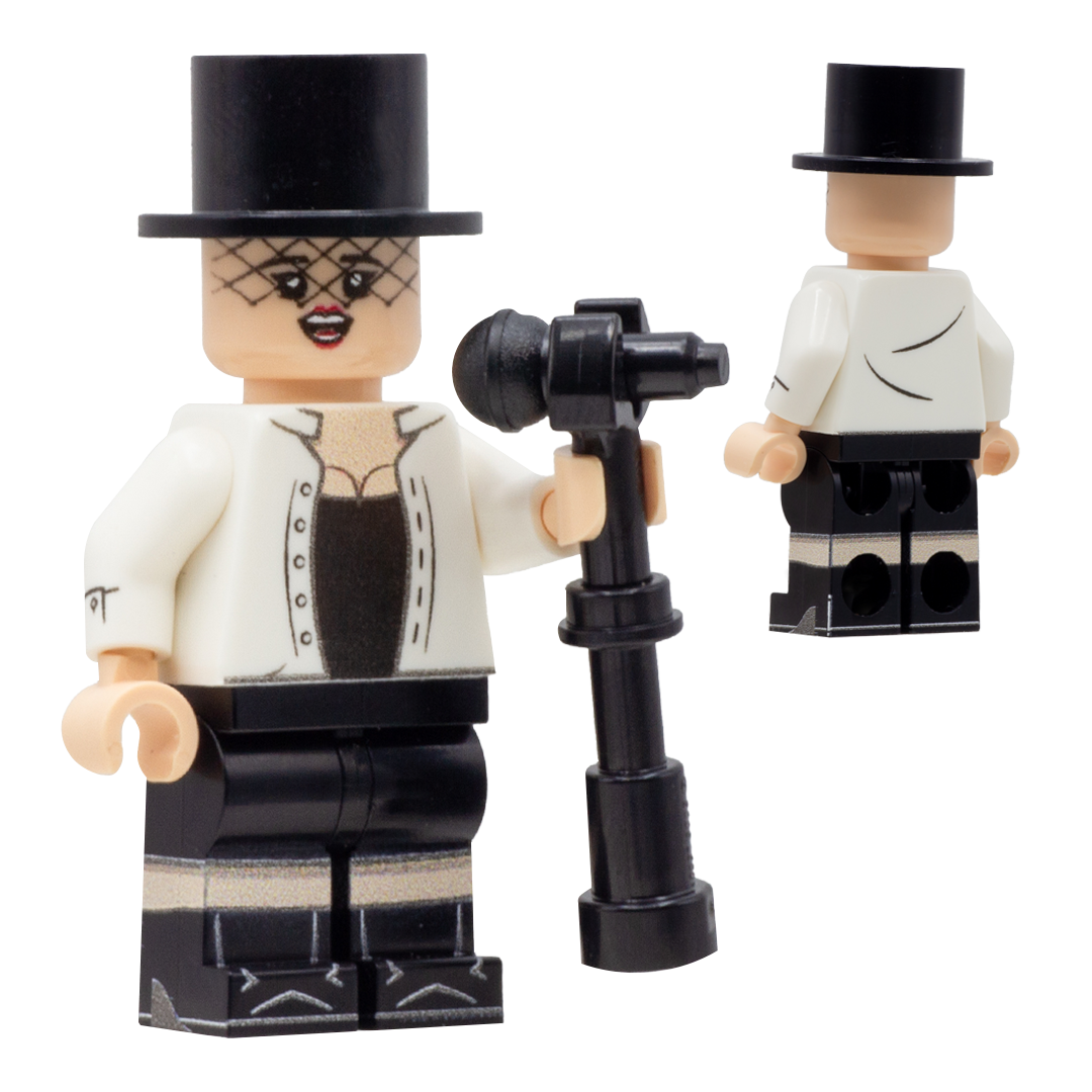  Custom printed LEGO Minifigure inspired by Shania Twain wearing white shirt and top hat and holding a microphone.
