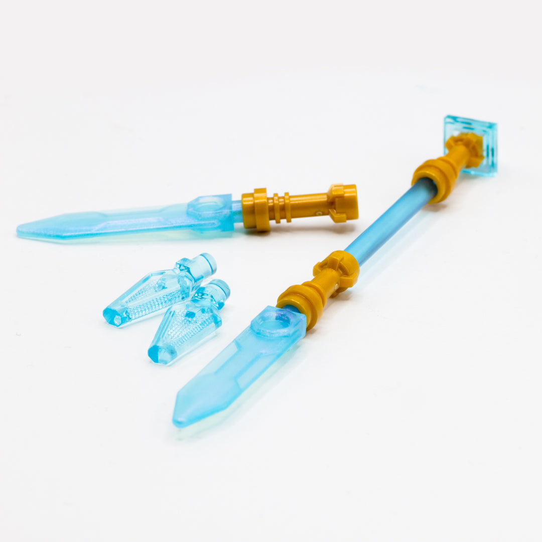 Three translucent blue and gold LEGO minifigure weapons inspired by K-Pop Demon Hunters animated movie.