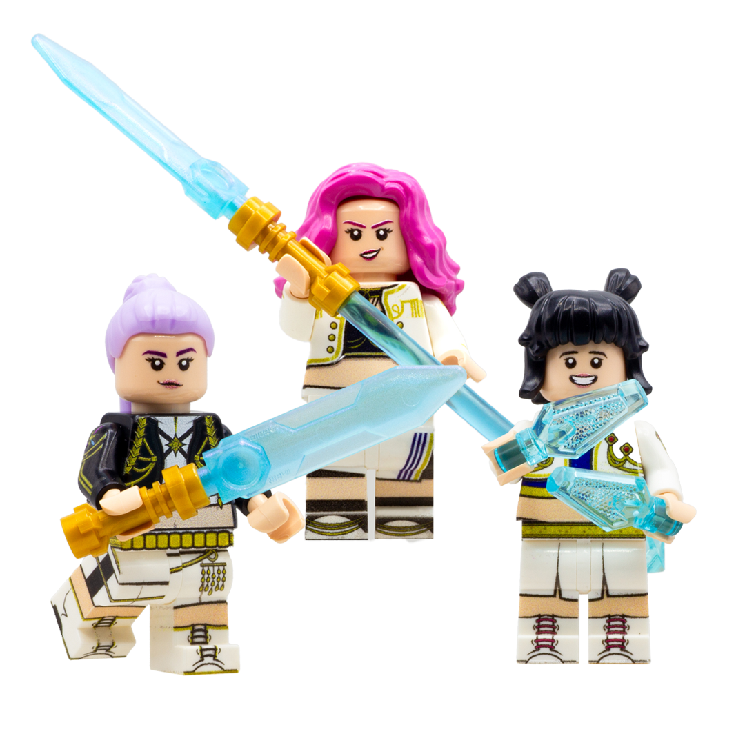 Rumi, Mira and Zoey-inspired custom minifigures holding their weapons.