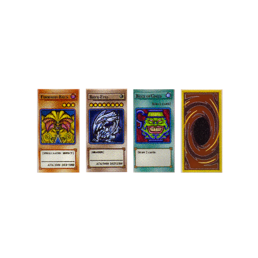 Four custom-printed LEGO tiles with design inspired by Duel Monsters playing cards, based on Yu-Gi-Oh! anime franchise. 
