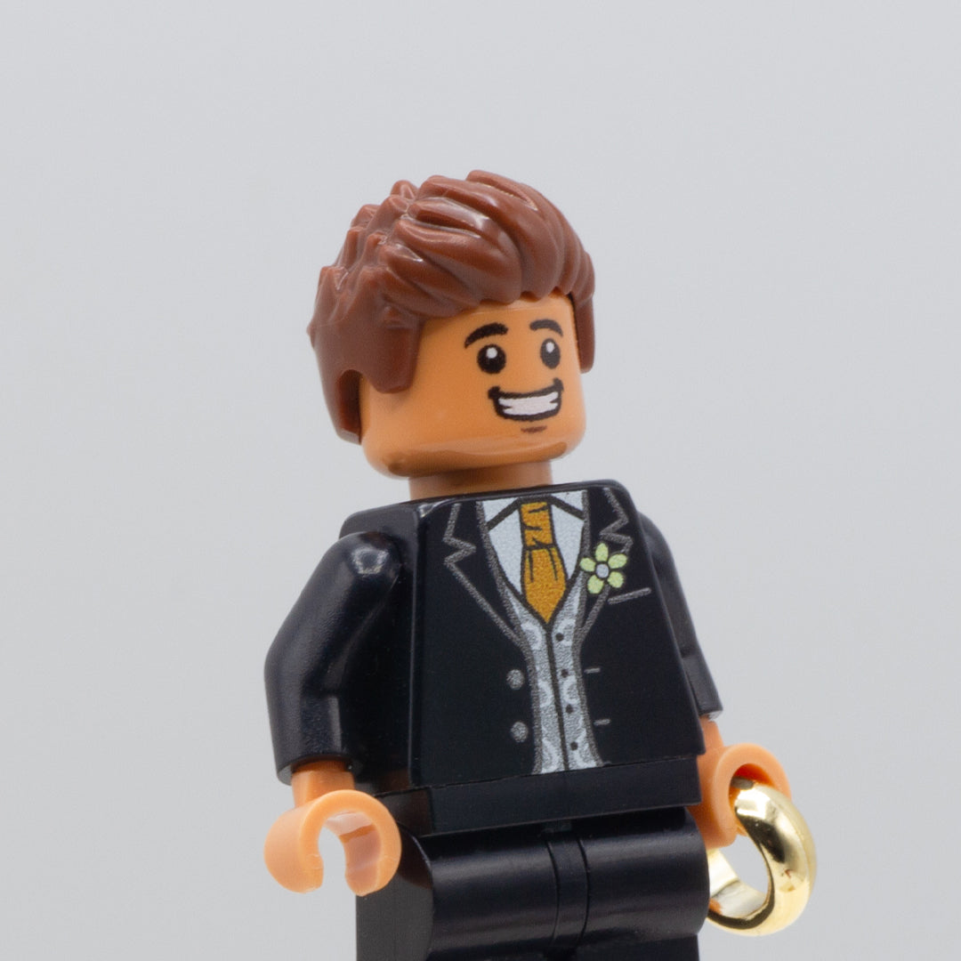 A custom LEGO minifigure wearing  brown LEGO minifigure hair accessory - short with spiked hairs. 