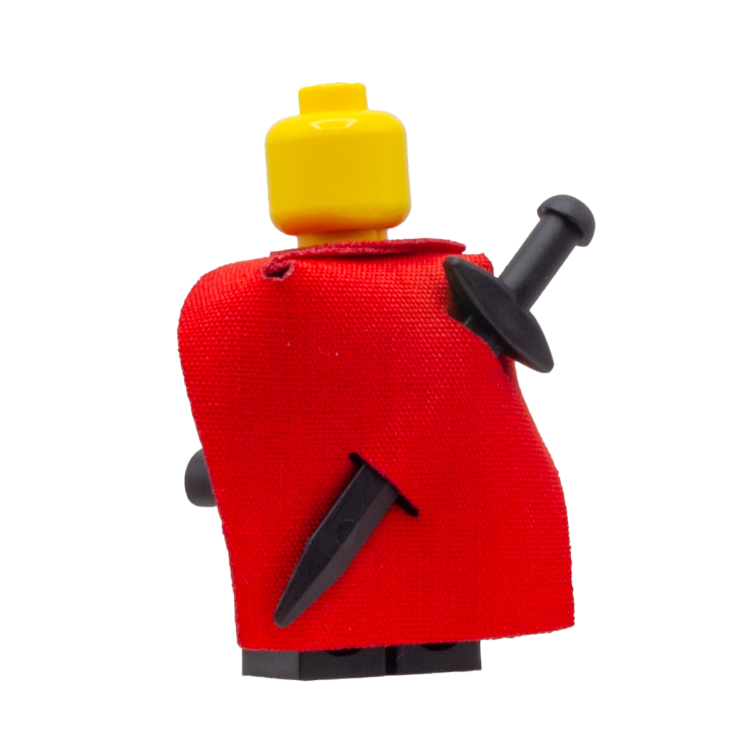 Minifigure wearing a red fabric cape with slots for LEGO swords.