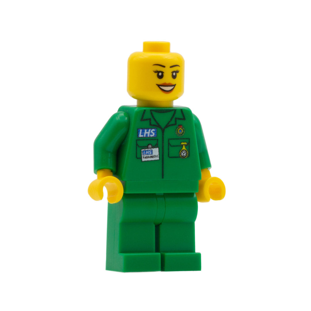 a custom lego minifigure wearing a green paramedic uniform with a lipstick smile and eyelashes 