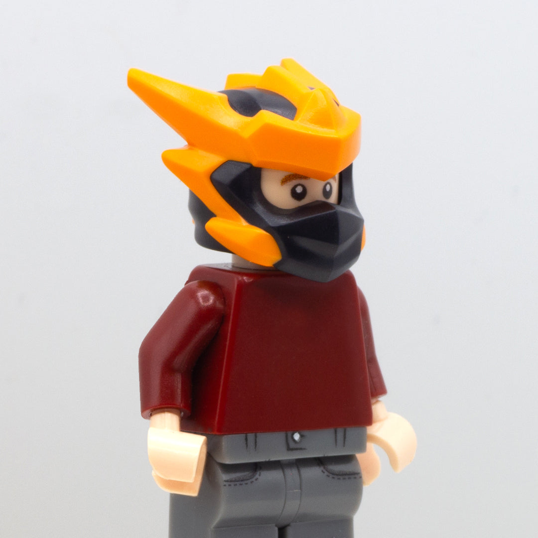LEGO minifigure wearing genuine LEGO Ninjago Dragons Rising headgear in black and orange (Cole in Dragon Form).