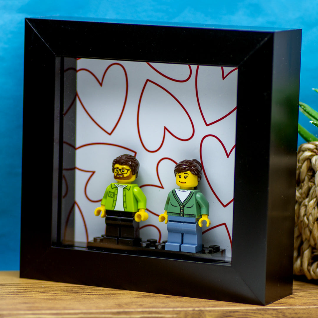 romantic gift of personalised LEGO minifigures in a frame with red hearts