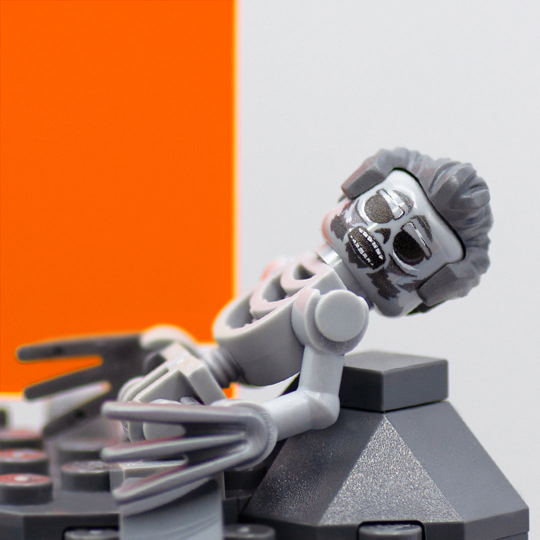 Custom LEGO display based on the scene from Deadpool and Wolverine movie, featuring orange Timedoor and the remains of Wolverine in LEGO form. Close up of the detailed print on Wolverine's head.