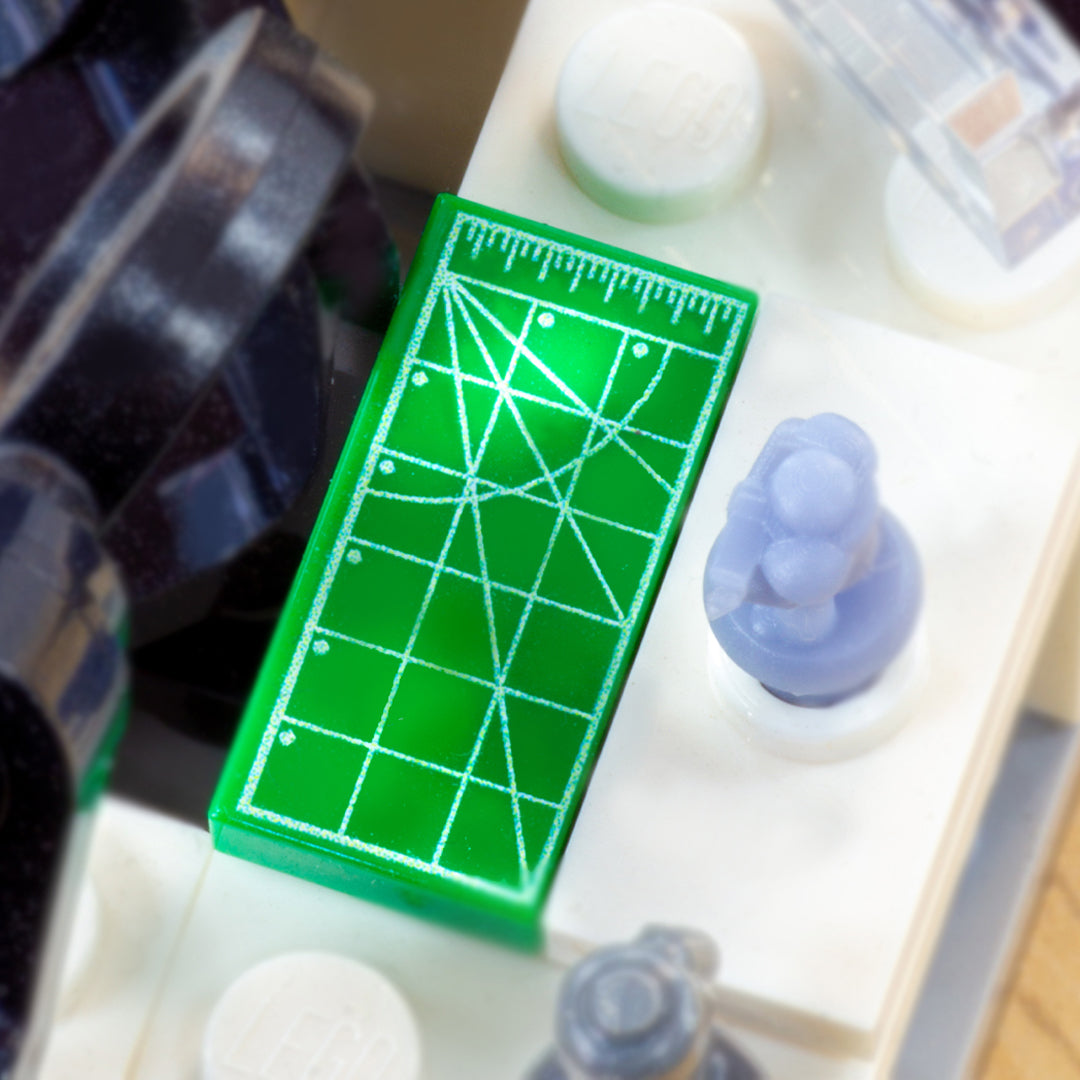 Close-up of a custom-printed tile of a green cutting matt.