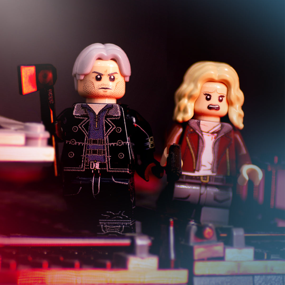 Leon and grace from Resident Evil 9 game as minifigures holding their LEGO weapons.