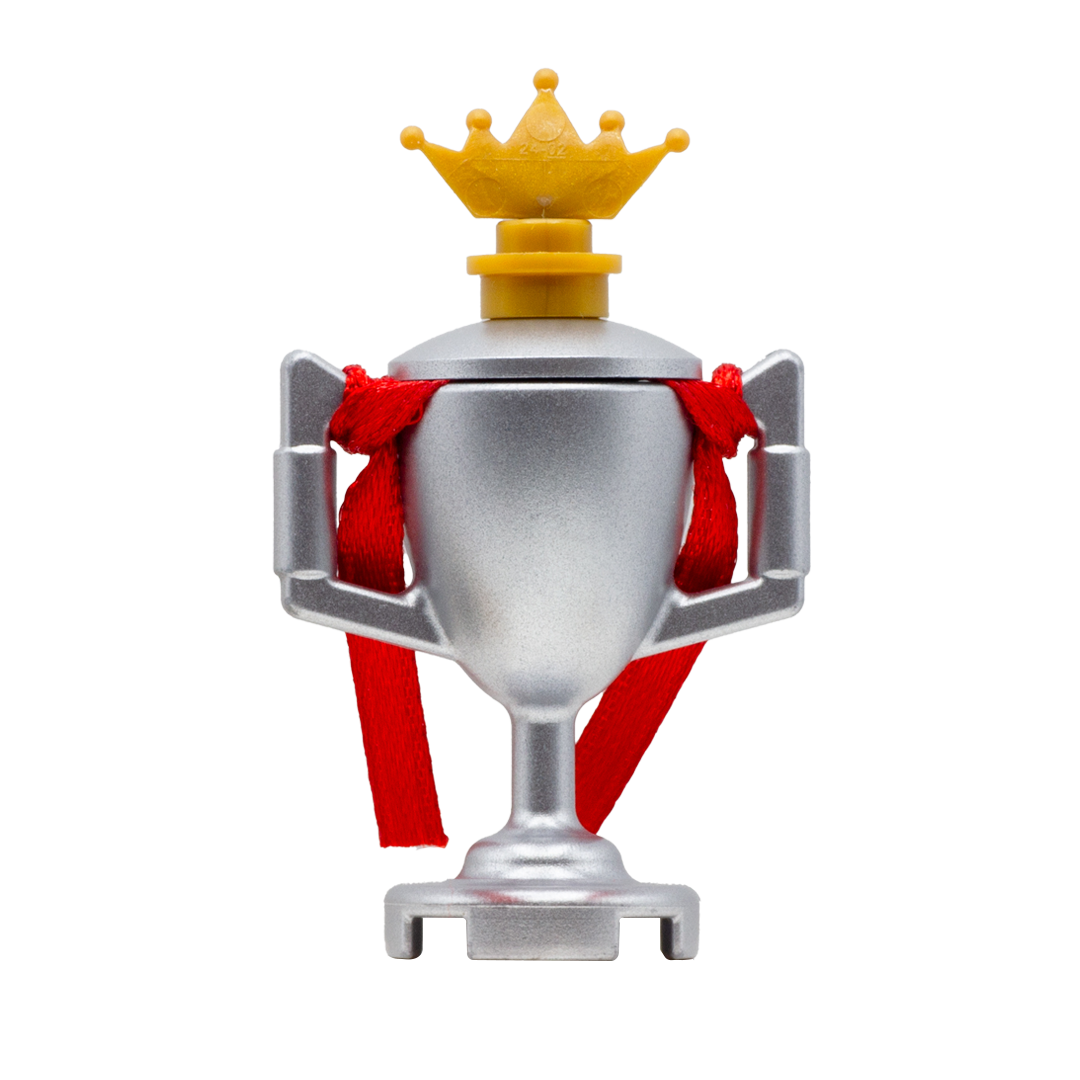 LEGO minifigure silver trophy with red ribbon and a golden crown.