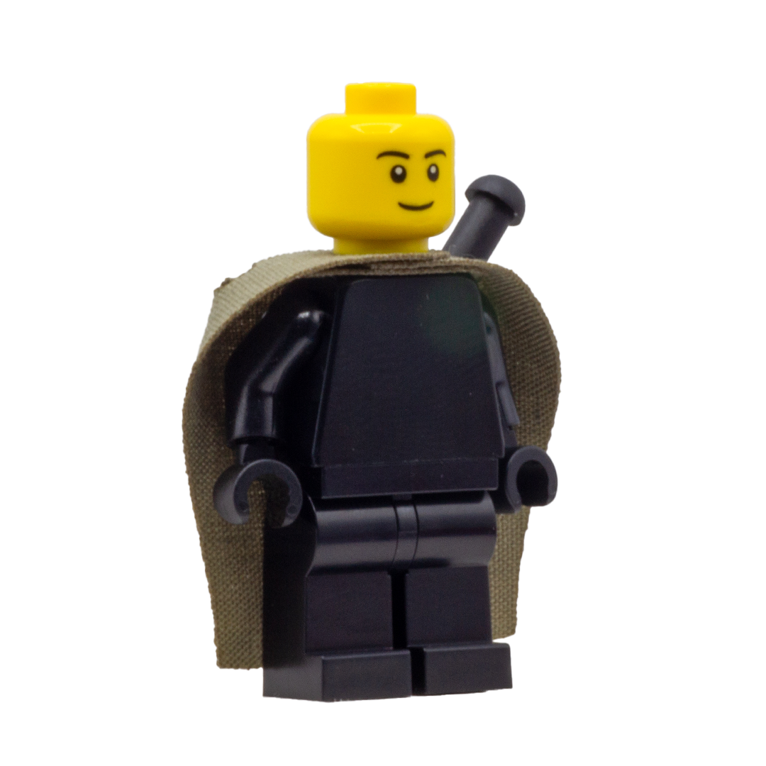 Front view of a minifigure wearing a khaki fabric cape with slots for LEGO swords.