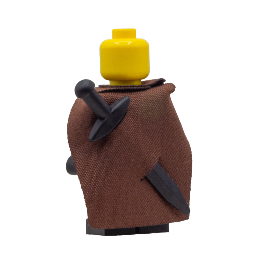 Minifigure wearing a brown fabric cape with slots for LEGO swords.