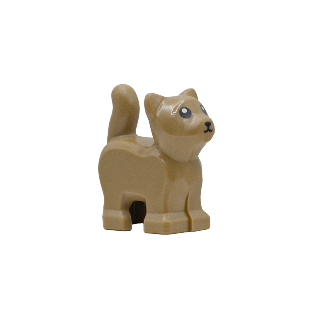 A small, light brown standing kitten LEGO accessory with its tail up and cute eyes.