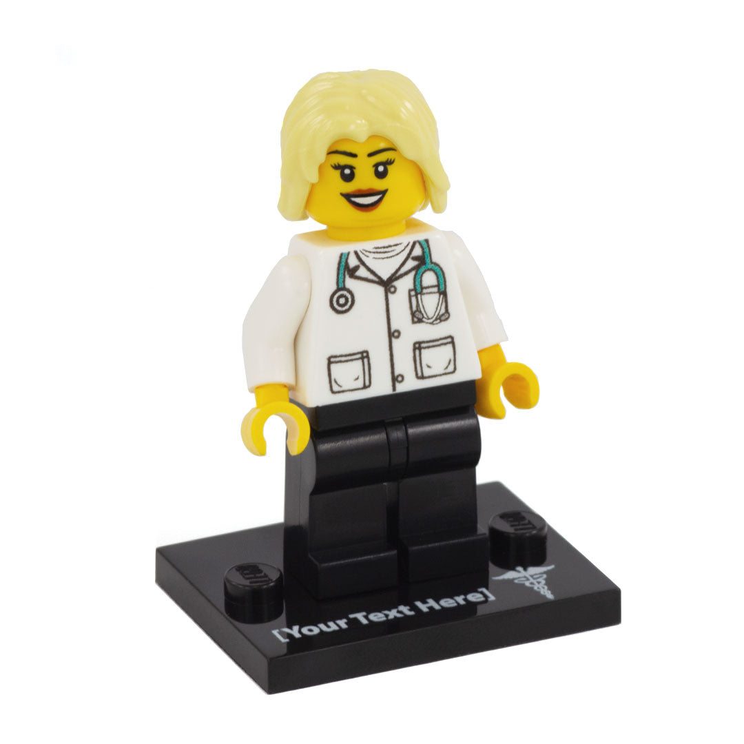 a custom lego doctor minifigure with blonde hair , smile and eyelashes standing on a custom text baseplate 