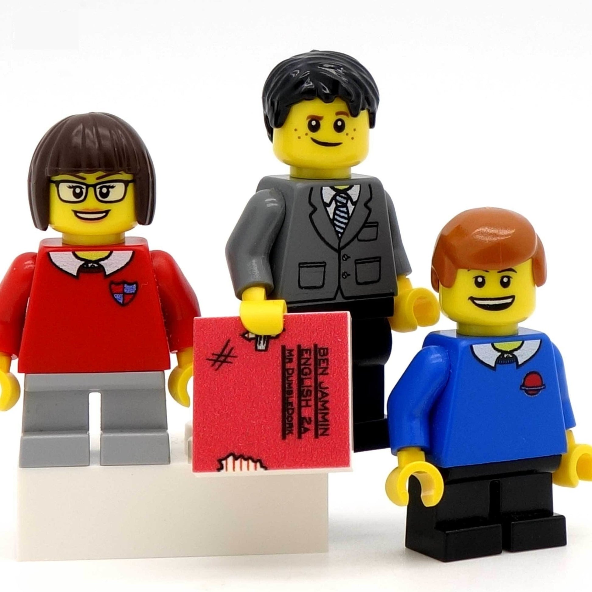 Minifig Holding Scruffy Notebook with Minifigs in School Uniform